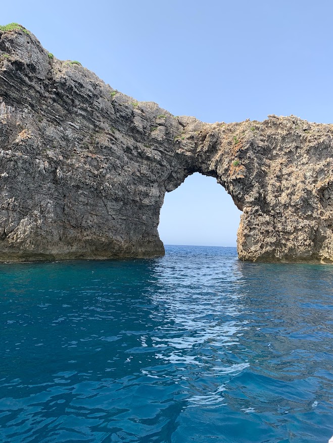 Rock archway seen from the boat, Menorca coastline
