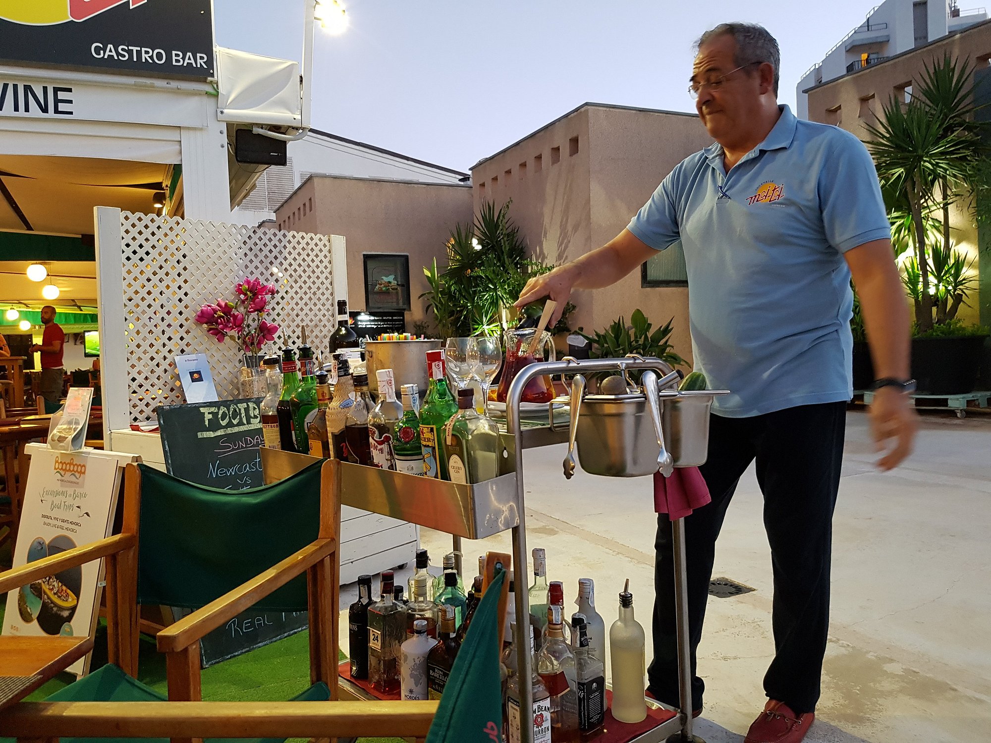 Drinks trolley being wheeled out on the terrace