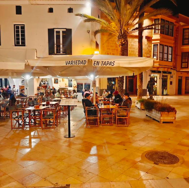Beers and tapas at a table on the square