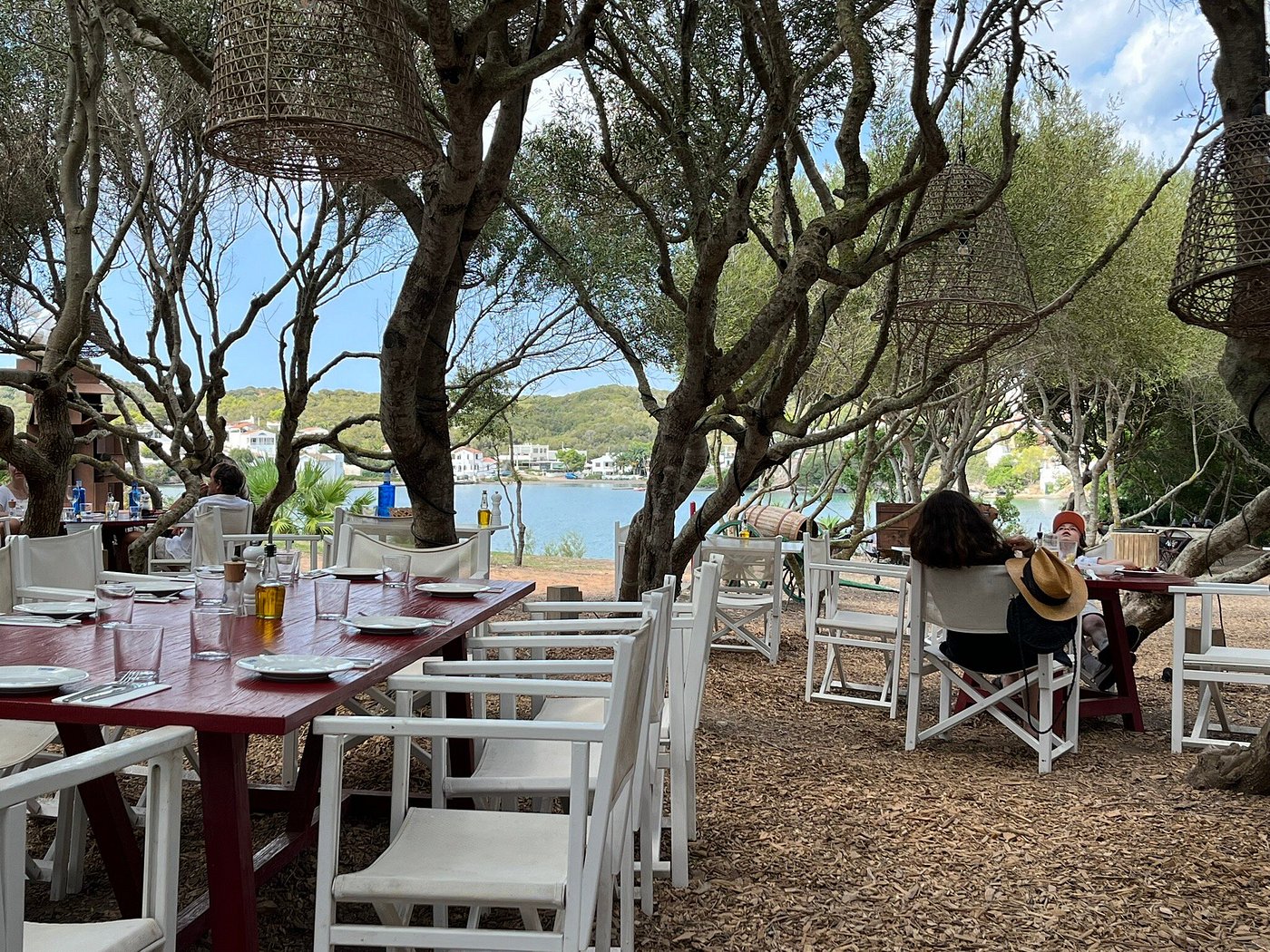 Cantina restaurant's shaded terrace overlooking the water