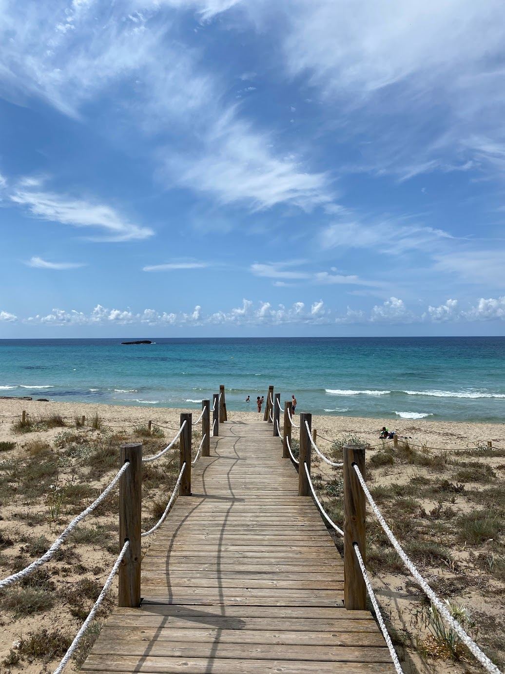 Boardwalk leading down to a Menorca beach