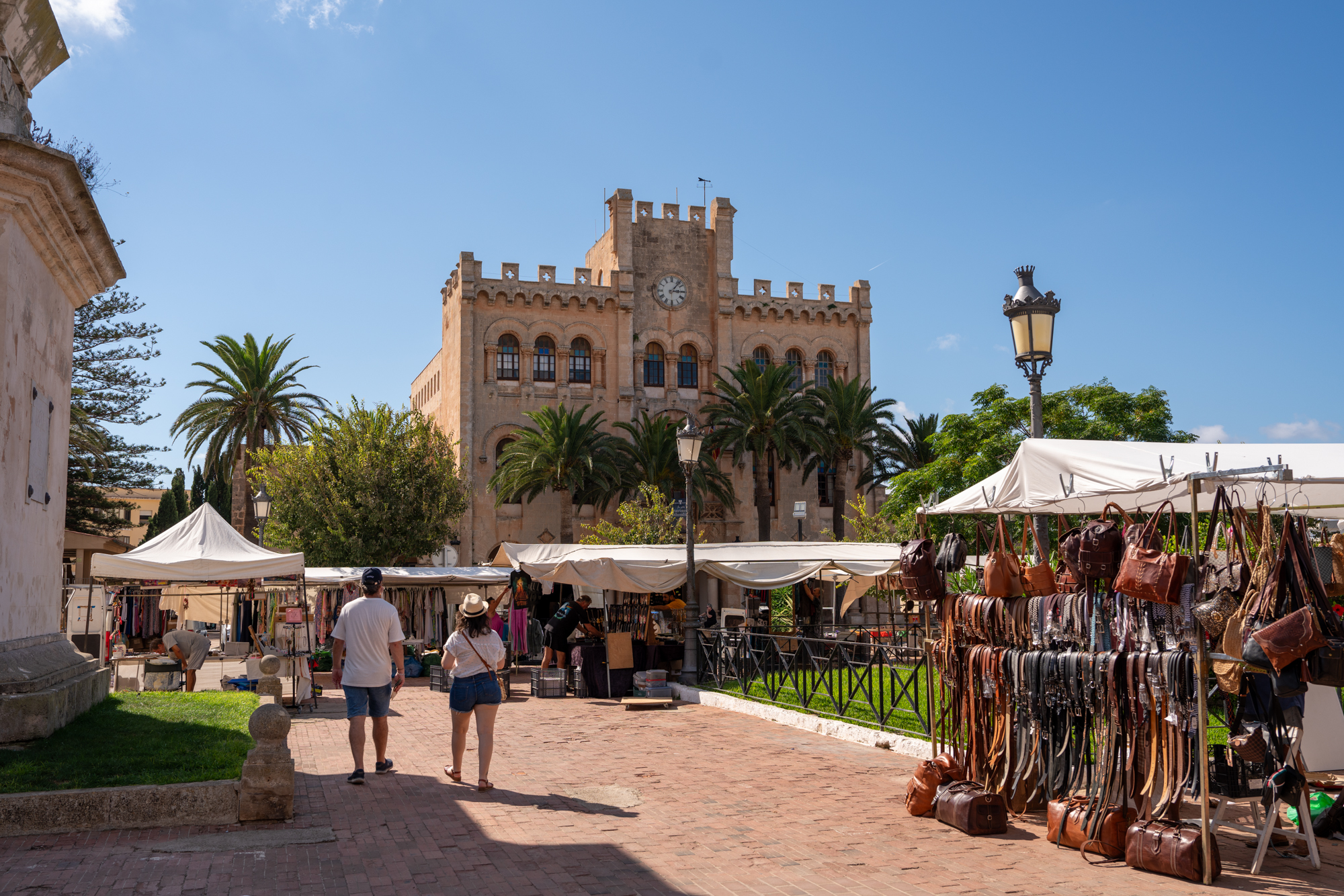 A market and the Ciutadella town hall building