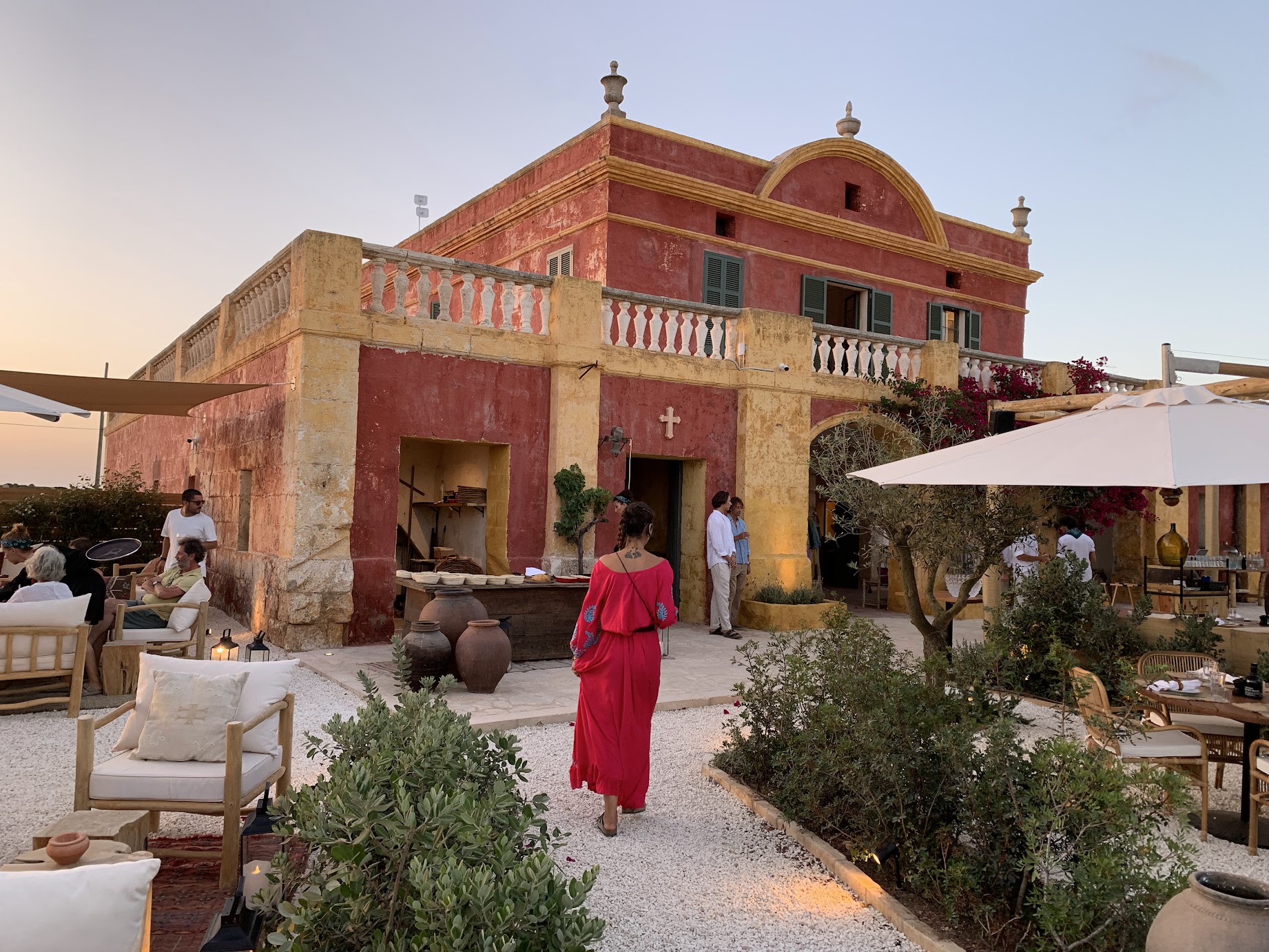 Nonna Bazaar's restored finca courtyard at sunset